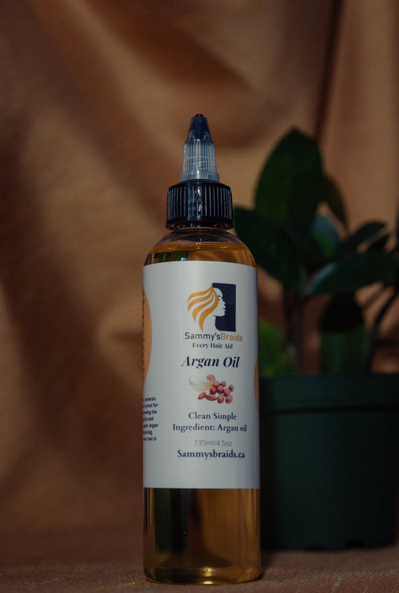 135ml bottle of pure argan oil for hair. The bottle is a twist cap for easy application to hair. 